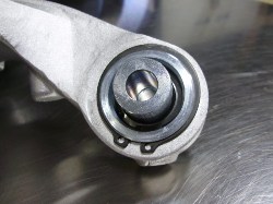 Install the supplied retaining ring. Cross Axis Joint in Knuckle, install snap ring